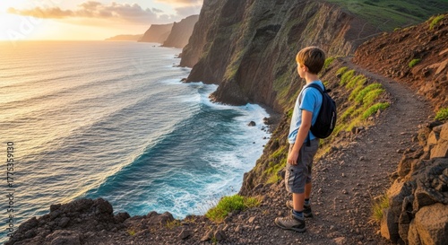Boy Gazing at Dramatic Coastal Cliffs and Ocean at Sunset, Madeira