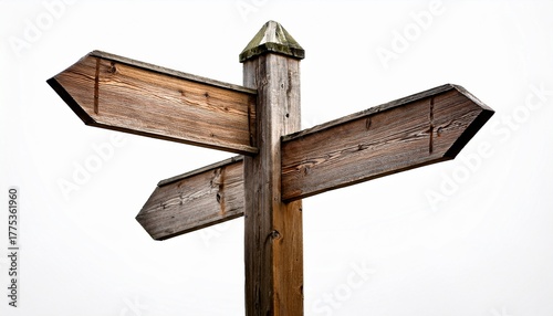 weathered wooden signpost displaying empty directional arrows against white background representing navigational choices and travel uncertainty