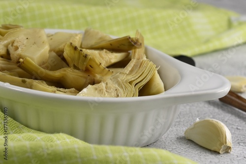 Artichokes in sunflower oil vinegar with garlic. Cynara cardunculus.