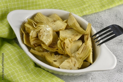 Artichokes in sunflower oil vinegar with garlic. Cynara cardunculus.