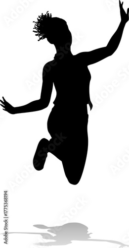 A happy woman jumping for joy in mid air silhouette person concept