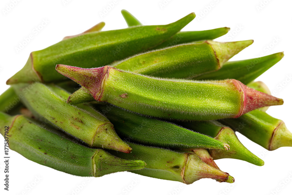 Fototapeta premium Fresh green okra pods piled high against a dark background