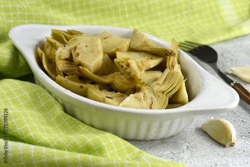 Artichokes in sunflower oil vinegar with garlic. Cynara cardunculus.