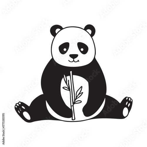 A panda sitting at the zoo holding bamboo