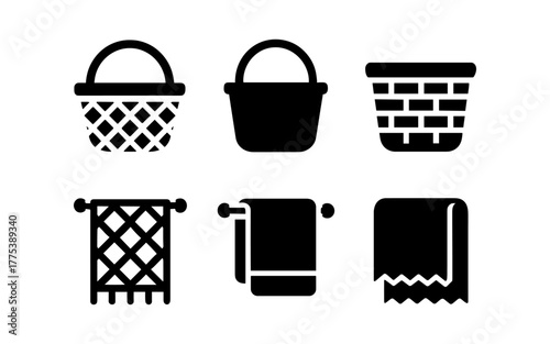 Set of laundry baskets and towels in minimalist simple icon style