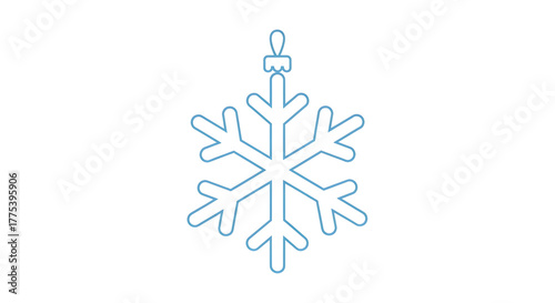 Delicate snowflake ornament hanging against a bright white background.