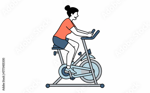 Woman exercising on stationary bike for fitness and healthy lifestyle cardio workout at home or in a gym concept