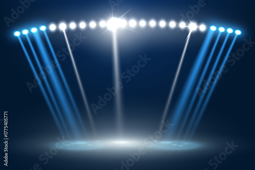 Bright blue concert spotlights create the effect of shining stars on the stage.