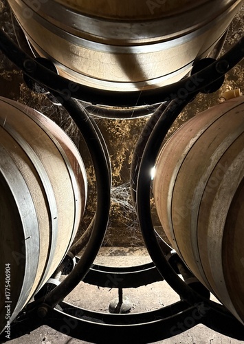 Traditional wine storage barrels in an old stone cellar