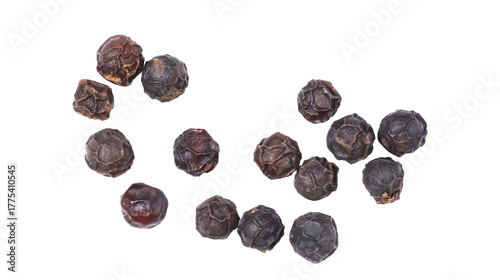 Dried black peppercorns arranged on white background, aromatic spice used for cooking, seasoning, and herbal recipes, organic natural ingredient for culinary and gourmet food concept.