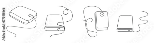 Hands connecting external hard drive to computer for data transfer and storage