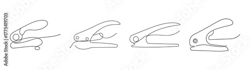 Close-up of a four-hole puncher tool revealing mechanism details
