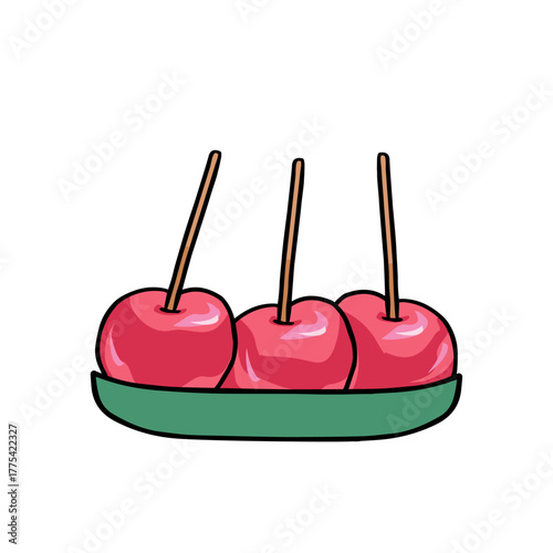 red apples in caramel on a plate