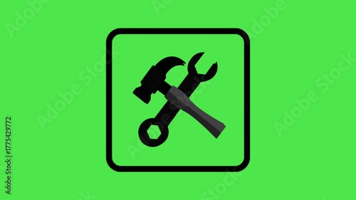 Animated wrench and hammer tools icon inside a box on a green screen. Use for repair service, chroma key, or maintenance graphic.