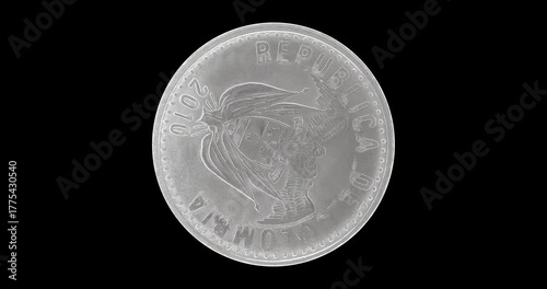 Obverse of Colombia coin 50 pesos 2010, isolated in black background. Loopable animation in 4k resolution video