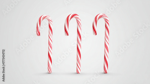  Festive Candy Canes PNG Set: Three Sizes Isolated for Holiday Designs, Perfect for Christmas Decorations and Cards