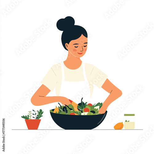  Young woman preparing a fresh healthy salad in a bowl