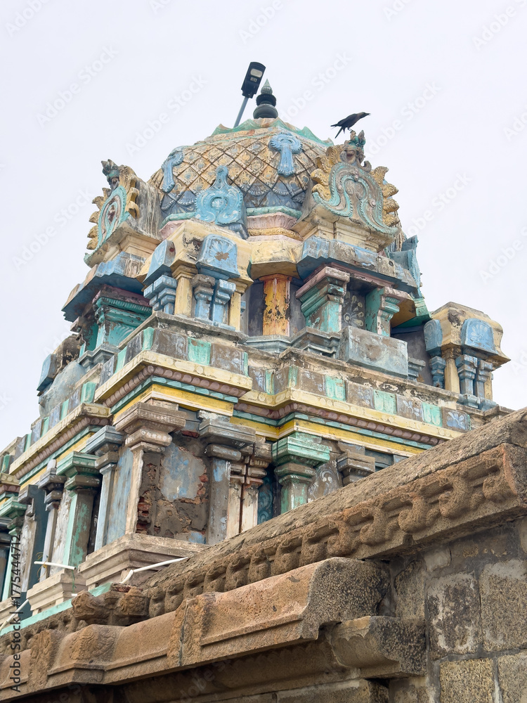 Naklejka premium View of Sri Masilanathar Temple tower near Tharangambadi beach in Tamil Nadu, along the Bay of Bengal's historic Danish colonial shore.