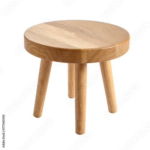 Simple round wooden stool with three legs isolated on a black background