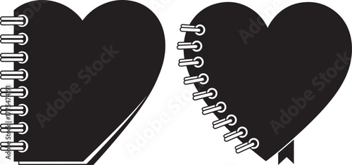 Two black heart shaped notebooks with spiral binding silhouette