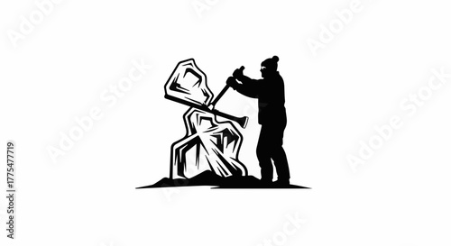 Artisan shaping molten glass with a blowpipe in a workshop