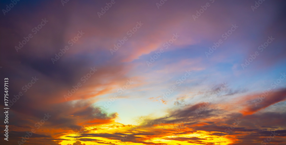 Fototapeta premium Clouds and sky backdrop at sunrise and sunset,Sunrise background. Dramatic majestic scenery sunset. Sky with clouds in Sunrise sky light background. Sunrise with clouds in various shapes.
