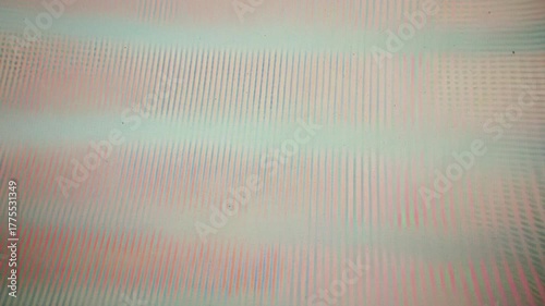 analog VHS video noise texture with horizontal lines and flickering distortion. The image shows a vintage television screen effect with static, interference, and scanlines.