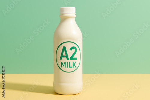 Fresh a2 milk alternative bottle for dairy intolerance relief in minimalist studio still life with pastel background