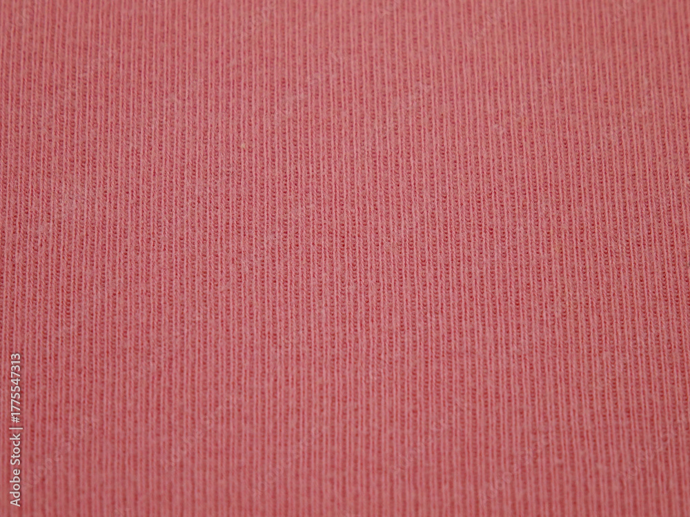 Fototapeta premium Pink cotton knitted fabric, textile background, top view