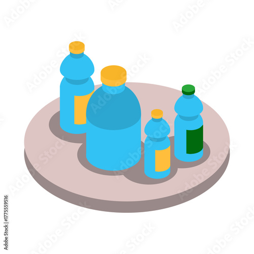 Assortment of blue plastic bottles with yellow and green caps on a gray surface, representing hydration and beverages