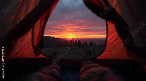 Amazing sunrise viewed from tent during outdoor trip