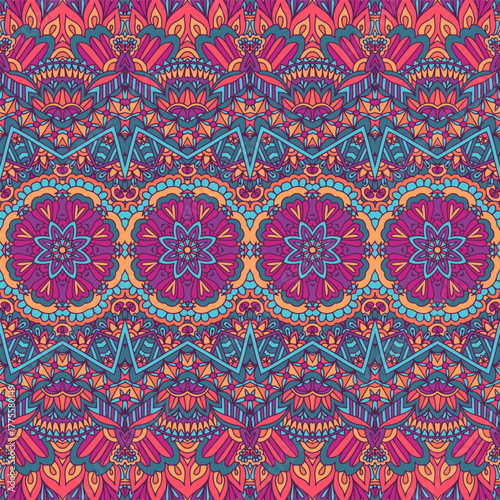 Festive colorful mandala art pattern. Geometric medallion doodle Boho style ornament. Psychedelic background art.