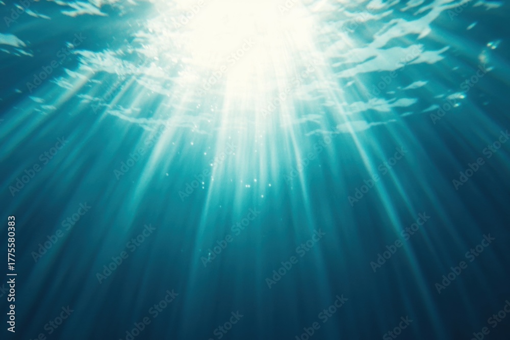 Fototapeta premium Sunlight Undersea: Dive into the serene depths, where ethereal sunlight dances through crystal-clear water, illuminating the ocean's mysteries in a moment of pure underwater bliss.