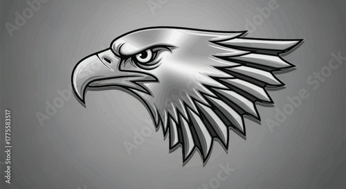 Silver eagle head profile with sharp details and a determined look on a gray background