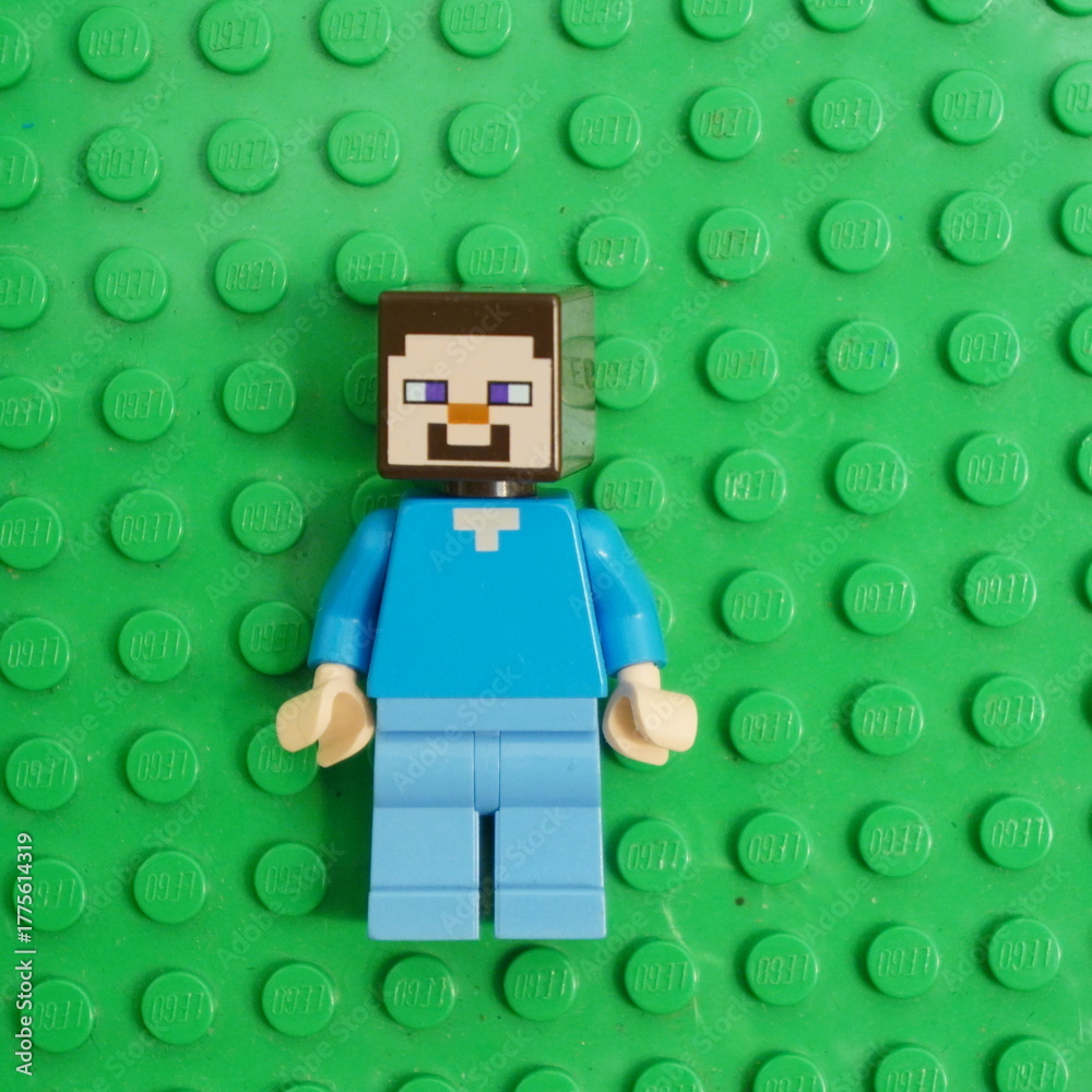Fototapeta premium LEGO Minecraft Steve Figure on Green Baseplate Iconic Building Toy and Collectible for Fans