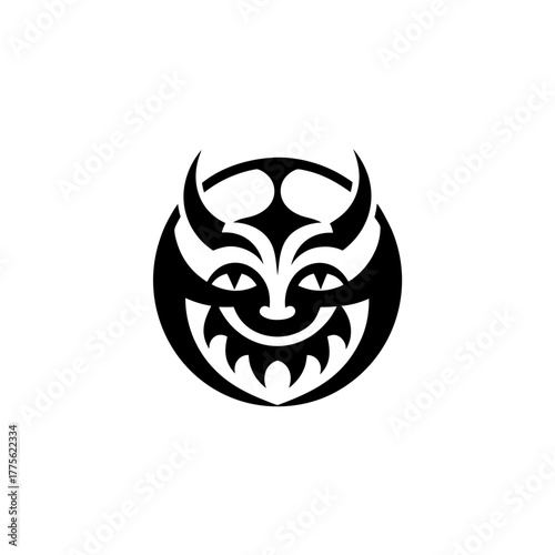 Stylized tribal devil face inside of a black circle on transparent background silhouette