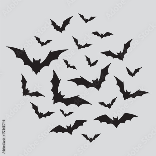 A swarm of dark silhouette bats flying in a circular pattern against a light pink background