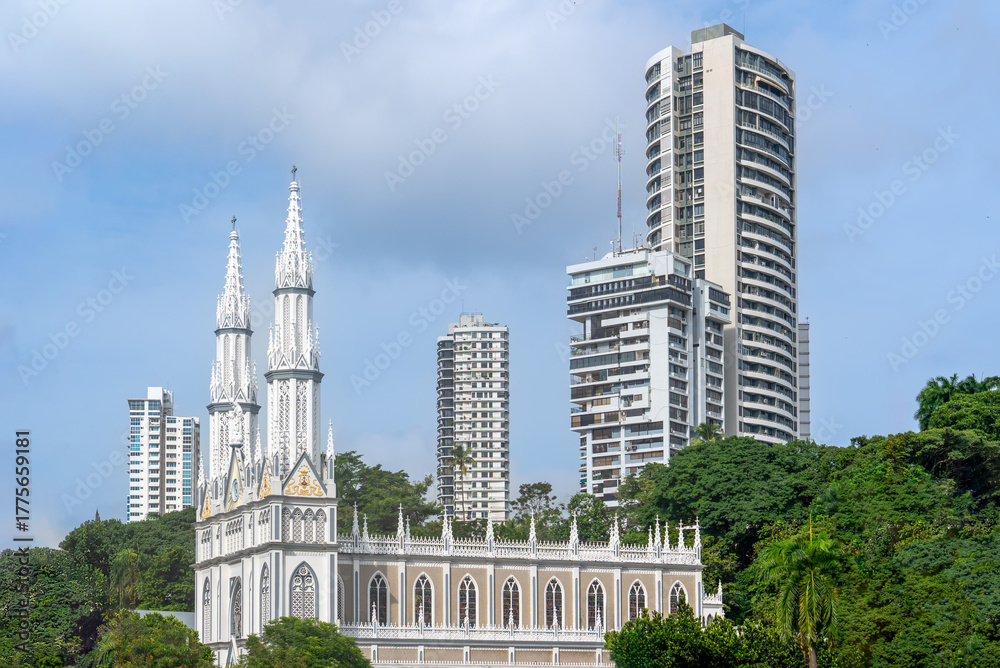 Fototapeta premium Panama, In Panama City view on the Iglesia del Carmen and modern buildings.
