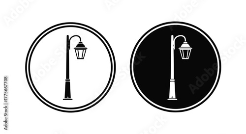 A pair of simple lamp post illustrations in contrasting black and white