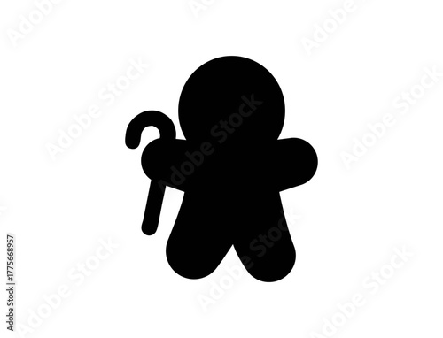 black silhouette of a gingerbread man holding a cane.