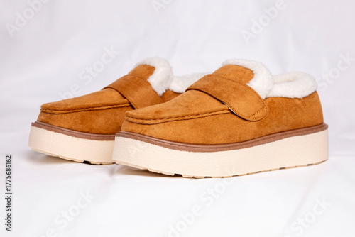 Stylish brown suede platform loafers with shearling lining