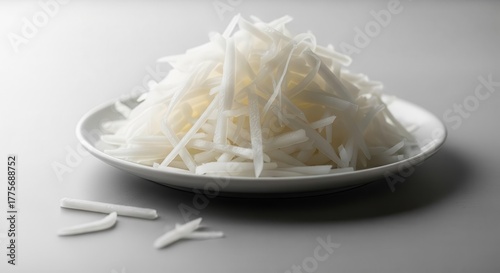 Freshly Sliced Daikon Radish on a Plate with Elegant and Minimalist Presentation