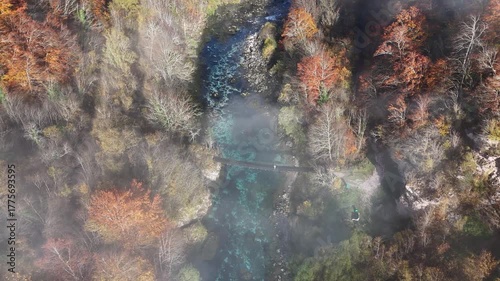 Stunning aerial drone footage of the Piva River and canyon in Montenegro. The video captures the breathtaking turquoise-blue water
