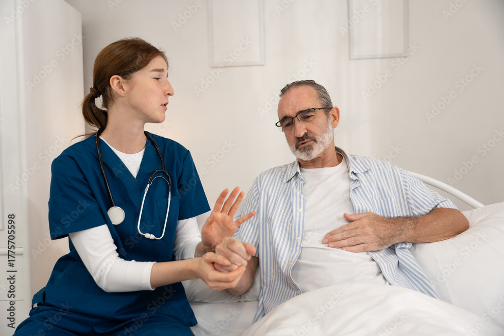 Obraz premium Home healthcare service for seniors with female nurse checking elderly man's heartbeat using stethoscope. Ideal for medical care, elder support, home visit, and heart health visuals.