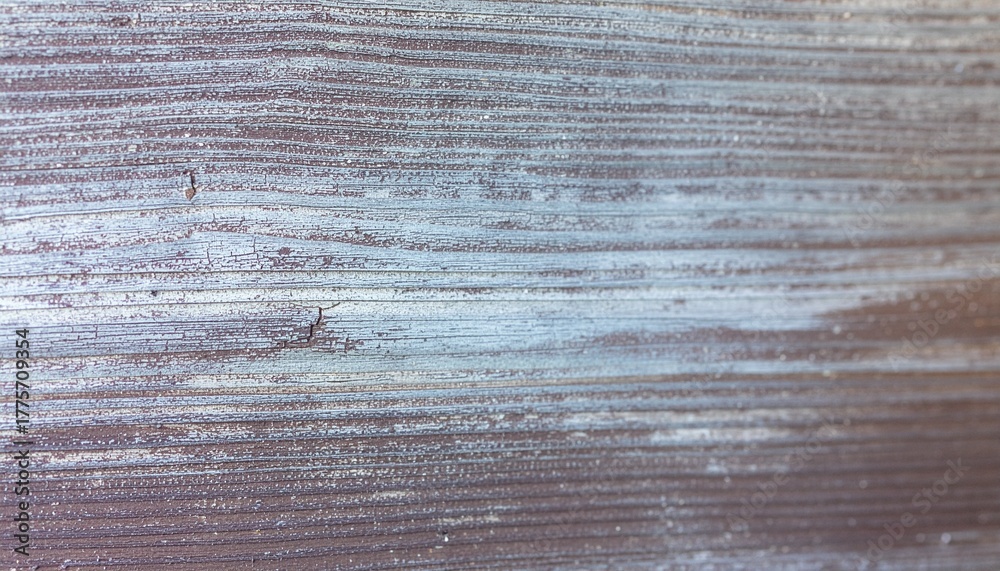Fototapeta premium Detailed weathered wood texture with faded paint and rustic grain. Perfect for product mockups, backgrounds, and vintage-style design