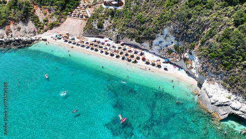 Aerial drone photo of amazing organised sandy beach of Wolf rocks with emerald crystal clear sea, Zakinthos island, Ionian, Greece