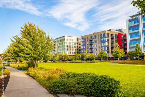 Modern Downtown Streetscape Featuring Mixed-Use Residential and Office Buildings.