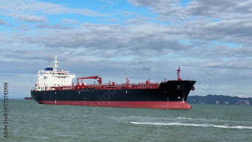 Oil tanker ship transporting fuel across sea route. Global logistics, maritime industry, international trade, oil and gas sector, transportation and infrastructure.