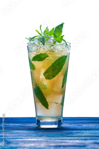 Close-up of a refreshing mojito cocktail with mint leaves, lime, and crushed ice in a tall glass