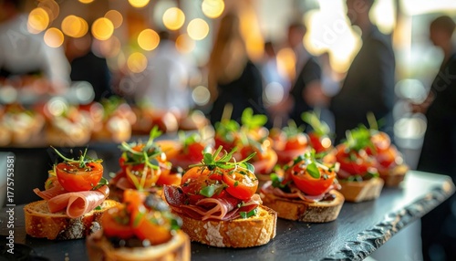 Gourmet bruschetta with cherry tomato, ham and herbs at elegant gathering showcasing culinary art, social event mood and fine dining celebration